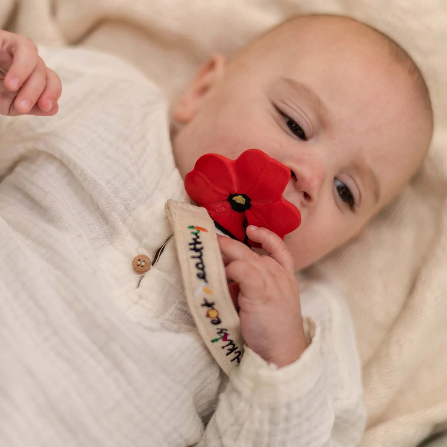 Pop The Poppy Mini Baby Teether 2 Pop The Poppy Mini Baby Teether - Image 2